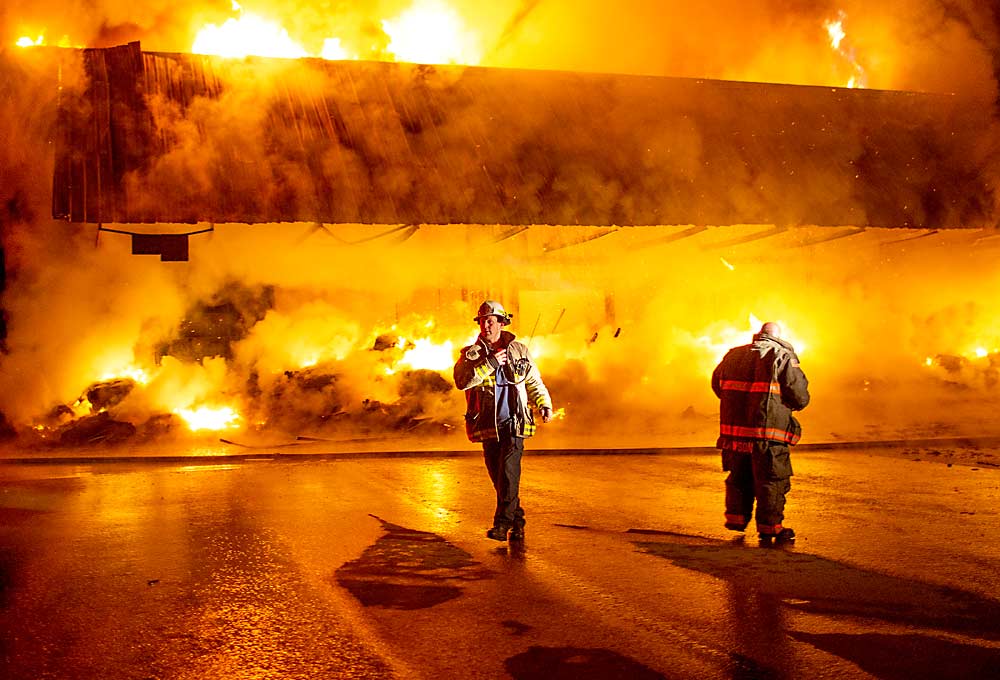A Blue Bird fruit warehouse in Peshastin, Washington, caught fire Sunday, March 3, leaving the building a total loss. (Reilly Kneedler/The Wenatchee World)