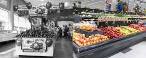 Past and present: The Washington Apple brand was once prominent in stores across the country. Today, the shelves are still filled with apples, but in the U.S., you’re more likely to see only a multitude of variety signs instead of big, regional displays for red, yellow and green apples. (Left, Good Fruit Grower archive; Right, TJ Mullinax/Good Fruit Grower)