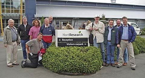 Members of the Washington Tree Fruit Research Commission's study tour  stand in front of HortResearch Havelock North (from left): Chuck Peters, Ray Schmitten, Kyle Mathison (kneeling), Dain Craver, Bryce Molesworth, Tom Butler, Jim McFerson, Jim Koempel, 