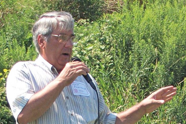 Dave Rosenberger described how he tested the effectiveness of low-volume nonrecycling drenches for fruit going into storage. His audience included New York fruit growers and International Fruit Tree Association members on tour during the fruit field day at Cornell Agricultural Research Station at Geneva,  New York.