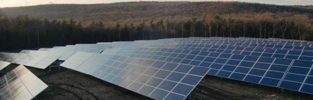 This 19-acre solar power system at  Knouse Foods will generate 4 million kilowatt-hours of electricity each year. The 14,000 230-watt polycrystalline solar panels face south with a 32-degree tilt. The system was installed on a long-closed waste-disposal site and took six months to complete.