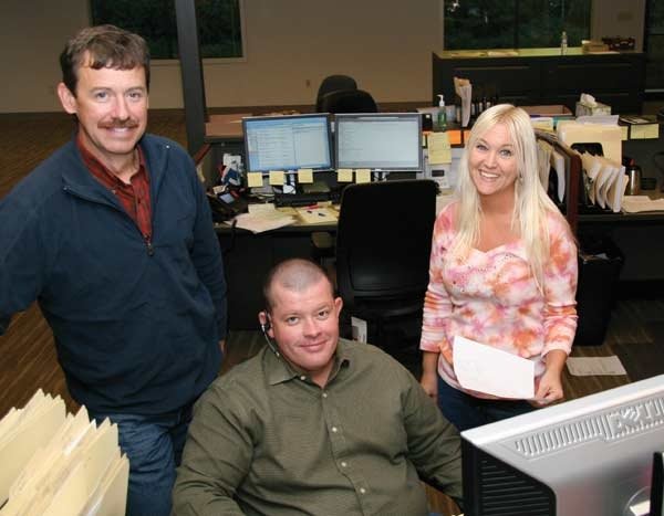 FirstFruits Marketing of Washington is the new kid on the marketing block. From left are Jim Hazen, business manager for Broetje Orchards, FirstFruits organic sales specialist Matt Miles, and Melissa Ollis, office manager