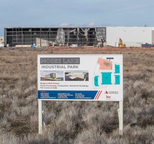 Work progresses on the new Okanagan Specialty Fruits slicing facility in March in Moses Lake, Washington. The company produces Arctic apples, genetically altered to not turn brown, and is building its own warehouse to keep up with customer demand and to process closer to its Columbia Basin orchards. (Ross Courtney/Good Fruit Grower)