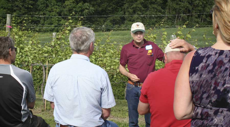 Carl Rosen, department head and professor in the University of Minnesota Department of Soil, Water and Climate, presents research results from the Northern Grapes Project at a field day. He is studying the effect of nutrients on vine health and ultimately on the wine. <b>(Courtesy Marjorie Bonse/University of Minnesota)</b>