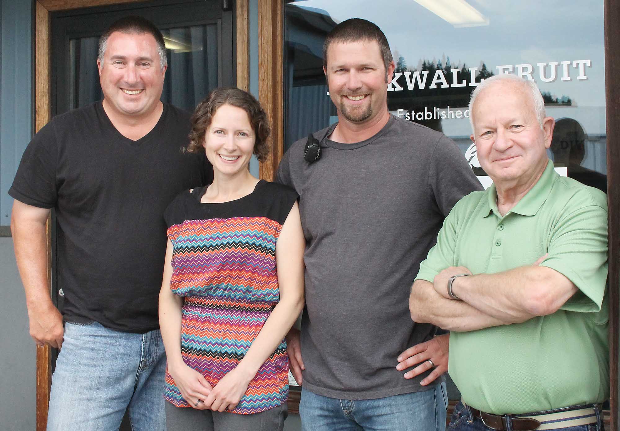 From right, Fred Duckwall with son Nathan Duckwall, daughter Sara Duckwall Snyder, and great-nephew Ed Weathers. (Geraldine Warner/Good Fruit Grower)