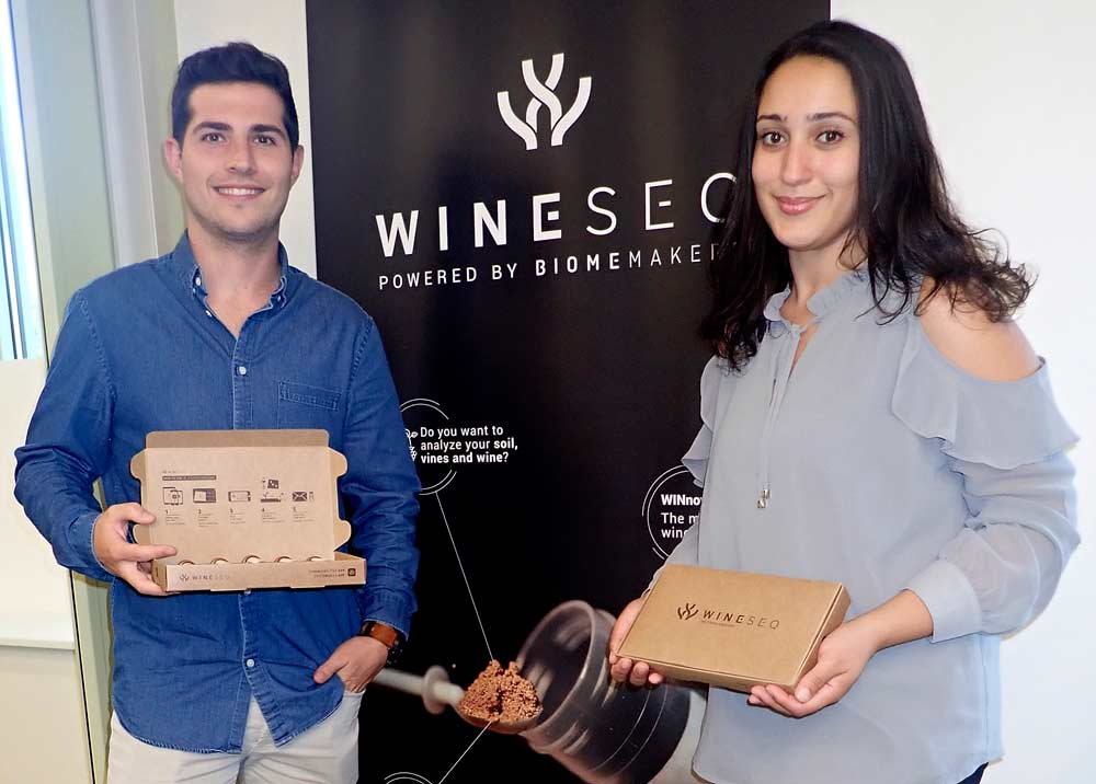 Mehrpour and Francisco De Frutos, business development manager at Biome Makers, show off the easy-to-use WineSeq kit. Growers need only put small soil samples in the tubes, mail them in, and wait a few days for the results. (Photo by Leslie Mertz)