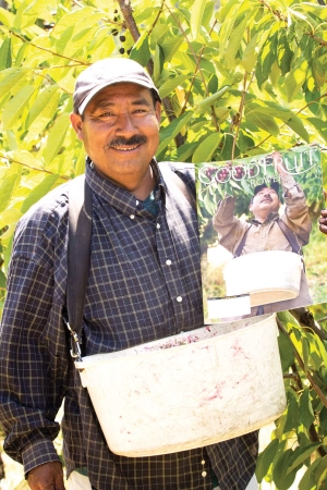 Ramon Lopez with the May 1, 2015, issue of Good Fruit Grower, which featured him picking cherries in Mosier, Oregon. Photo by Paloma Ayala