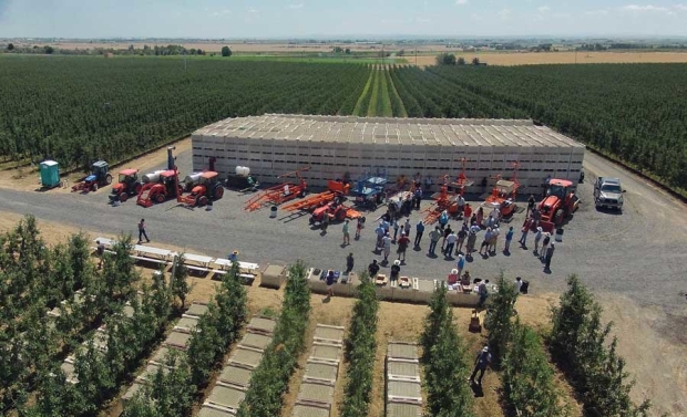 Harvesting, pruning, trimming and bin removal machines like these displayed during an IFTA tour last summer in Washington can help growers reduce labor, improve orchard production and decrease costs. <b>(TJ Mullinax/Good Fruit Grower)</b>