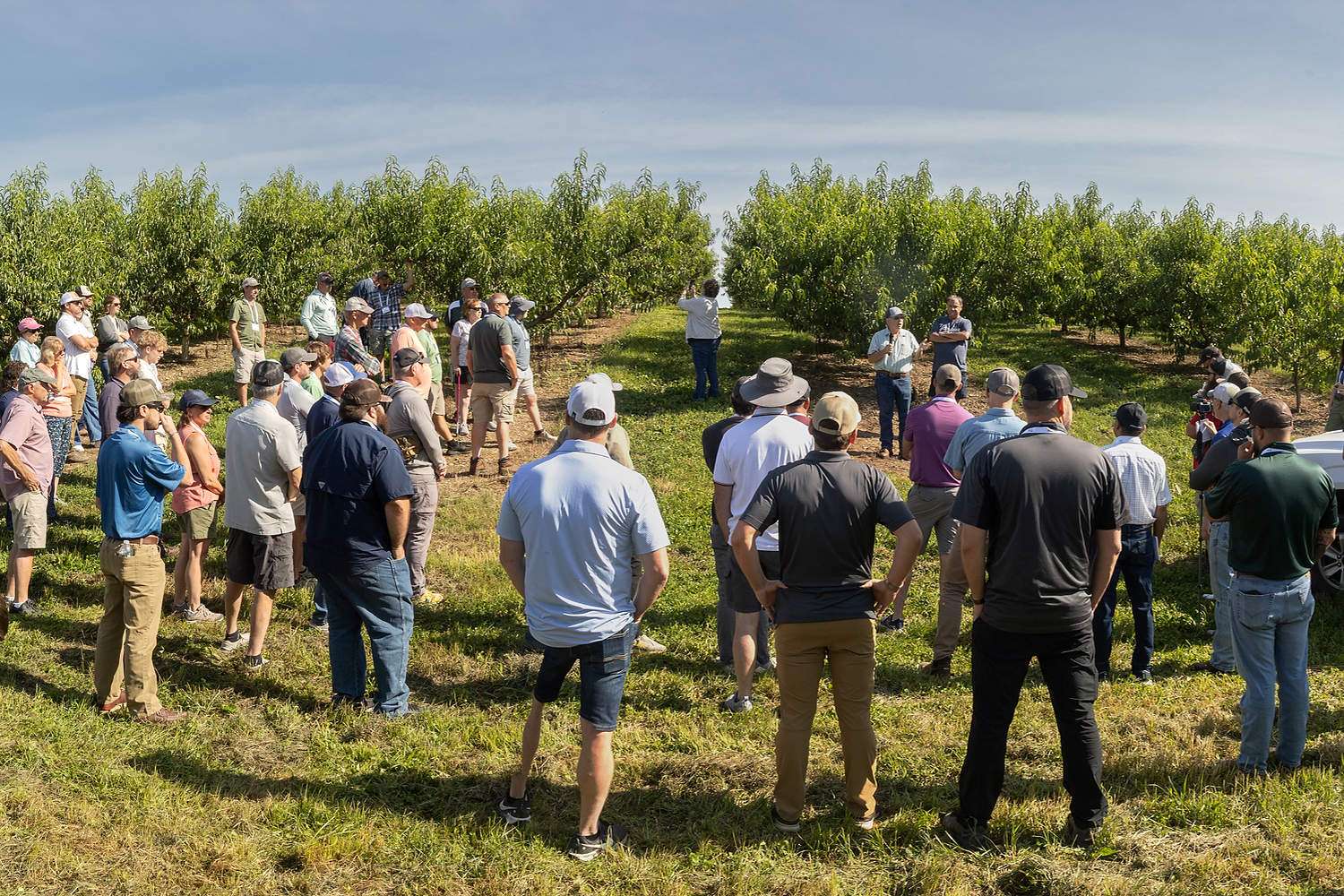 International Fruit Tree Association tour-goers listen to Dan Donahue speak at Klein’s Kill Fruit Farms in New York’s Hudson Valley in July.