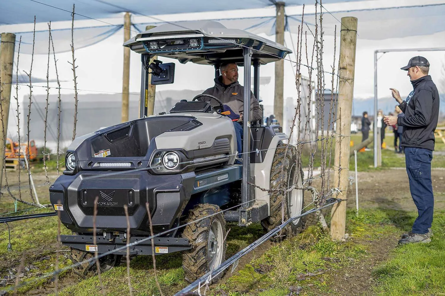 All-electric cherry production Forest Lodge Orchard imported a Monarch electric tractor from California in 2023 and had a New Zealand company build a custom electrostatic sprayer to run off the tractor’s battery. Importing emerging technology poses a risk, owner Mike Casey acknowledged, including from Monarch, which went out of business earlier this year. Overall, though, he has found strong return on investment from going electric. (Courtesy Forest Lodge Orchards)