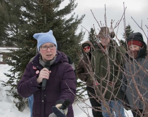 Nikki Rothwell of the Northwest Michigan Horticulture Research Center discusses management techniques at a Bear Lake tart cherry farm on Thursday, Feb. 11, 2016, as part of the International Fruit Tree Conference in Grand Rapids, Michigan. (Ross Courtney/Good Fruit Grower)