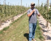 Randy Kober describes his experiences with a plant-in-place block of Honeycrisp during RidgeFest 2020, the annual summer fruit tour organized by Michigan Pomesters on Aug. 6 in Kent City, Michigan. (Matt Milkovich/Good Fruit Grower)