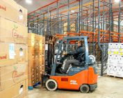 Bagged apples await loading, packed into 36-pound boxes. Michigan and states farther east are closer to the majority of the U.S. population, which gives them a freight advantage over the Pacific Northwest. (Matt Milkovich/Good Fruit Grower)