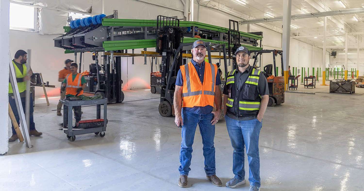 Ray Schmitten, president of Blue Bird, left, and Shawn Cox, president of Peshastin Hi-Up Growers