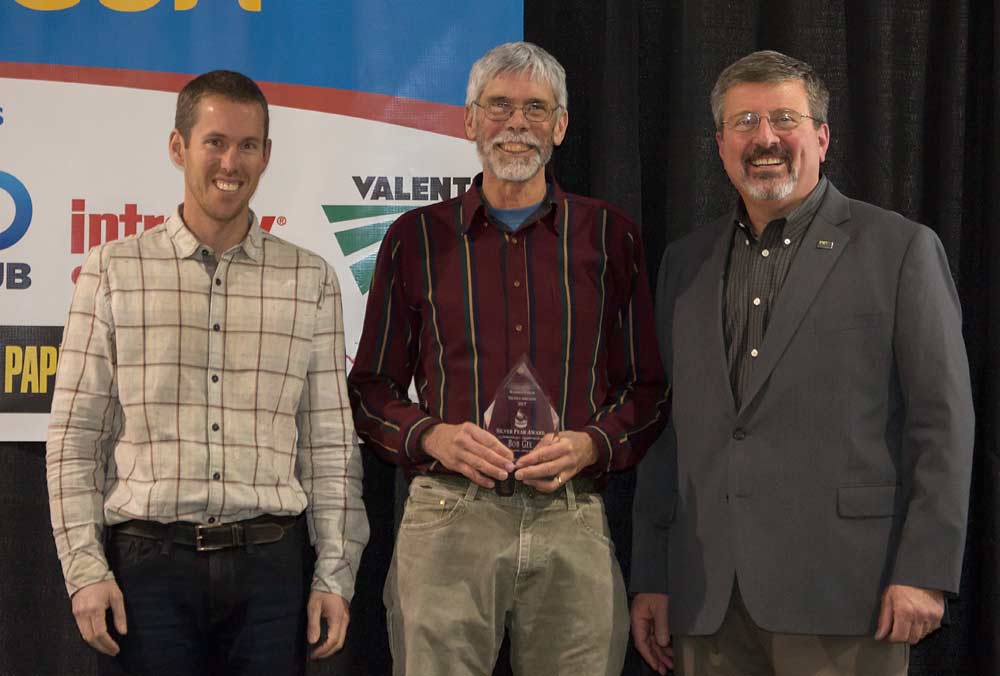 Bob Gix is honored with the Silver Pear award during the Washington State Tree Fruit Association 113th Annual Meeting on December 5, 2017. <b>(TJ Mullinax/Good Fruit Grower)</b>
