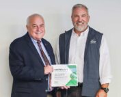 Derek Sandison, director of the Washington State Department of Agriculture, thanks Washington Apple Commission president Todd Fryhover for his service to the industry at the commission’s meeting on Oct. 15 in Ellensburg. Fryhover retires at the end of this month. (Kate Prengaman/Good Fruit Grower)