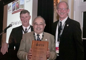 Harold Thome, center, is honored with the Hall of Fame Award in Grand Rapids on Feb. 8, 2016. <b>(Ross Courtney/Good Fruit Grower)</b>