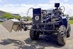 A Weed-It module attached to an all-terrain vehicle