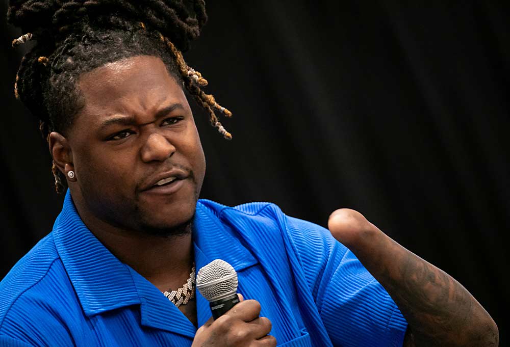 Shaquem Griffin, a former collegiate and NFL player, discusses family, faith and overcoming adversity during the lunchtime keynote Friday at the 81st annual Cherry Institute in Yakima, Washington. (TJ Mullinax/Good Fruit Grower)