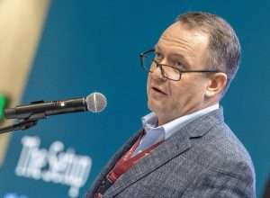 Adam Brohimer of Luminary Insights, speaking to cherry growers at the 83rd Annual Cherry Institute, said retail has room for higher prices that would pull everybody’s profits higher. Brohimer delivered the keynote presentation on Jan. 7 at the Yakima Convention Center in Yakima, Washington. (TJ Mullinax/Good Fruit Grower)