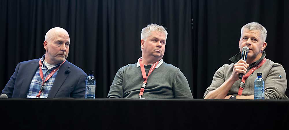 From left, Mike Taylor, Jeff Baldwin and Robert Kershaw speak on the marketing panel during the 81st Annual Cherry Institute at the Yakima Convention Center in Yakima, Washington, in January. (TJ Mullinax/Good Fruit Grower)