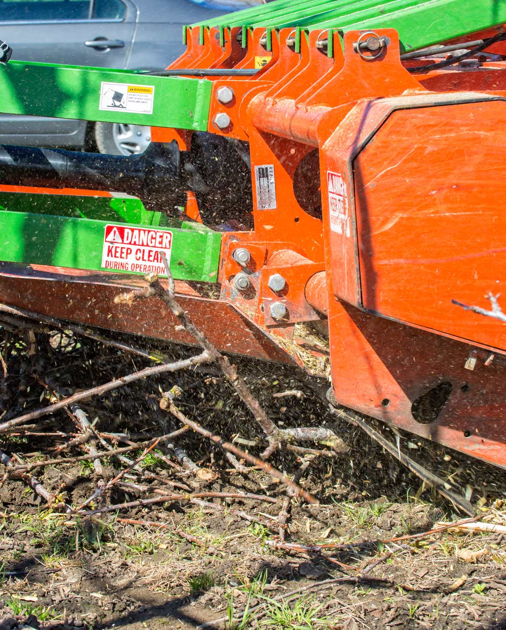 Fresh cherry prunings, as large as 6 inches in diameter, are mulched during the OSU demonstration.<b> (TJ Mullinax/Good Fruit Grower)</b>
