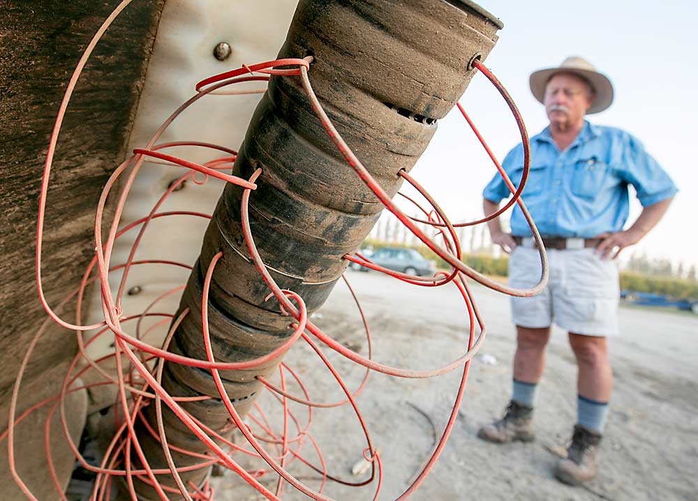 Steve and Alex consider weeds the biggest challenge at their 90-percent-organic farm and rely on this Berti Ecosprint weeder to help control them. (TJ Mullinax/Good Fruit Grower)