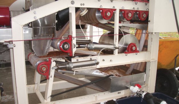 A continuous belt press at Tulip Valley Orchard and Vineyard in Mount Vernon, Washington.