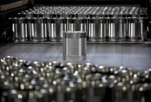 Large, 105-ounce cans wait to be filled at the Del Monte Foods cannery in Yakima, Washington, in November. As retail demand for canned fruit continues to decline, Del Monte closed the facility in May. (TJ Mullinax/Good Fruit Grower)