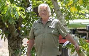 Rick DeLap in his Wasington orchard