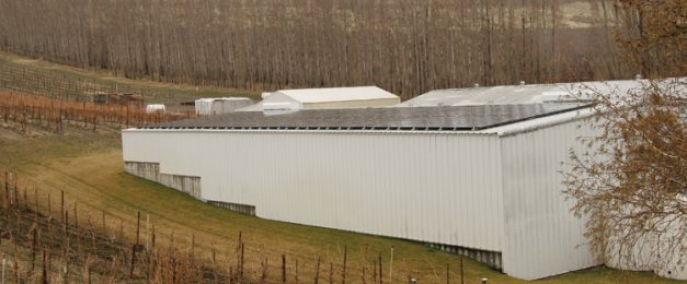 More than 160 photovoltaic panels rest on the rooftop of Powers Winery, generating about 20 percent of the winery’s electricity needs.