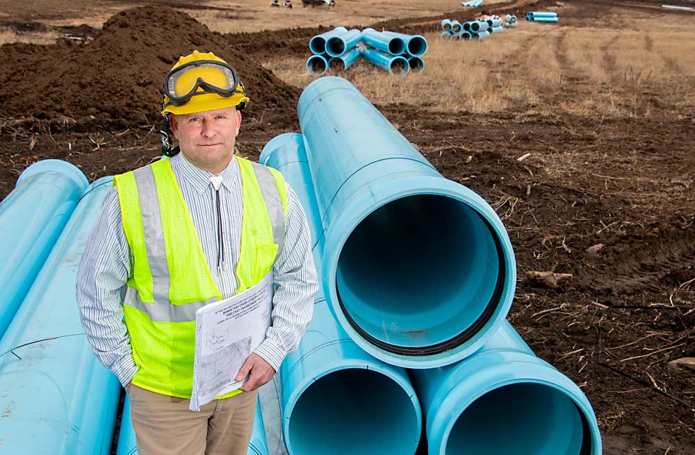 In 2015, Urban Eberhart took Good Fruit Grower on a tour of one of the Yakima Basin Integrated Plan’s first projects, piping laterals to increase water conservation on the Kittitas Reclamation District. Having those pipes in place in 2015 allowed the district to pump water backward into Manastash Creek to keep water flowing for fish, the sort of farmer-fisheries cooperation that would have been unthinkable before the integrated plan brought the groups together with a shared vision of a more resilient water system. (TJ Mullinax/Good Fruit Grower)