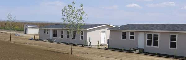 Loans from the Washington State Department of Commerce have funded a variety of housing styles for seasonal farmworkers, including these manufactured units.