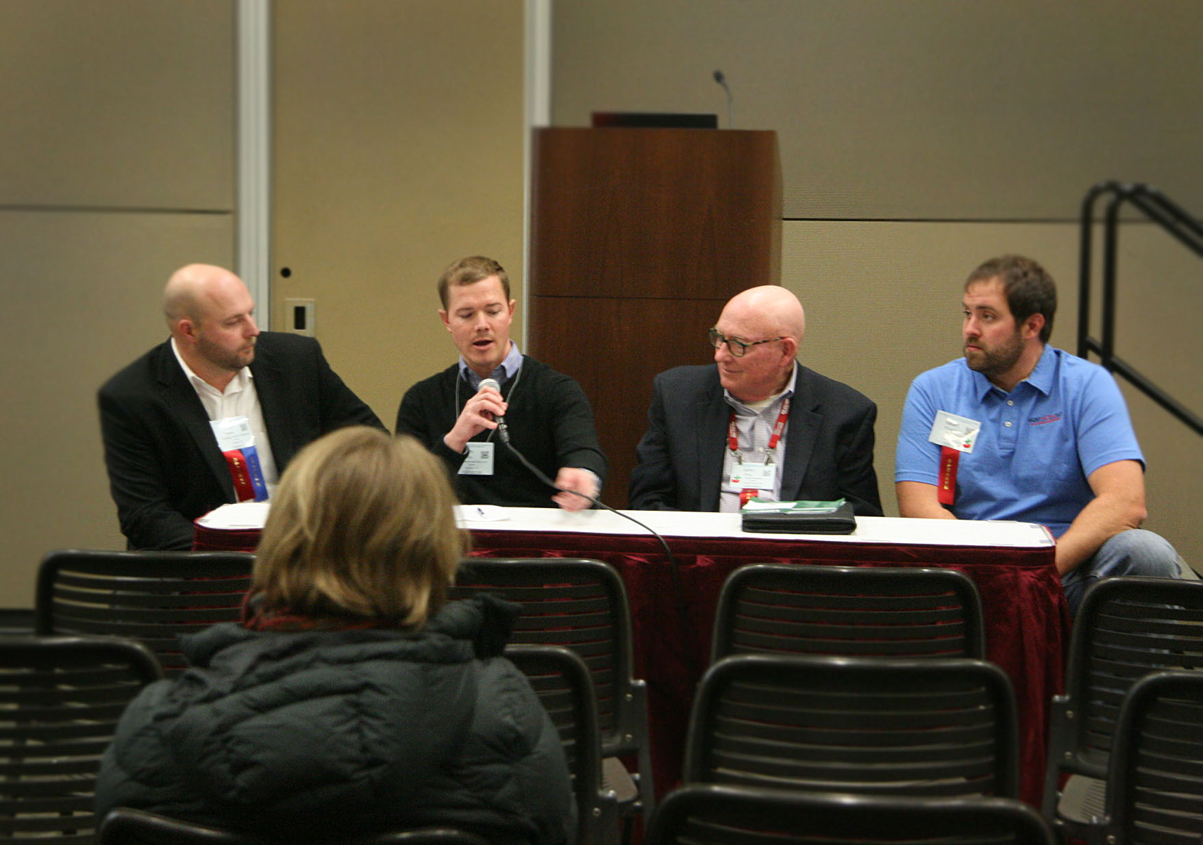 Michigan consumers want local sweet cherries, so there is good money to be made in fresh production if Michigan growers can deliver top quality, said growers on a sweet cherry panel, including, from left to right, Justin Finkler of Riverridge Produce; Adam Dietrich of Leo Dietrich and Sons; John King, of King Orchards; and Isaiah Wunsch, of Isaiah Wunsch Farm. <b>(Kate Prengaman/Good Fruit Grower)</b>