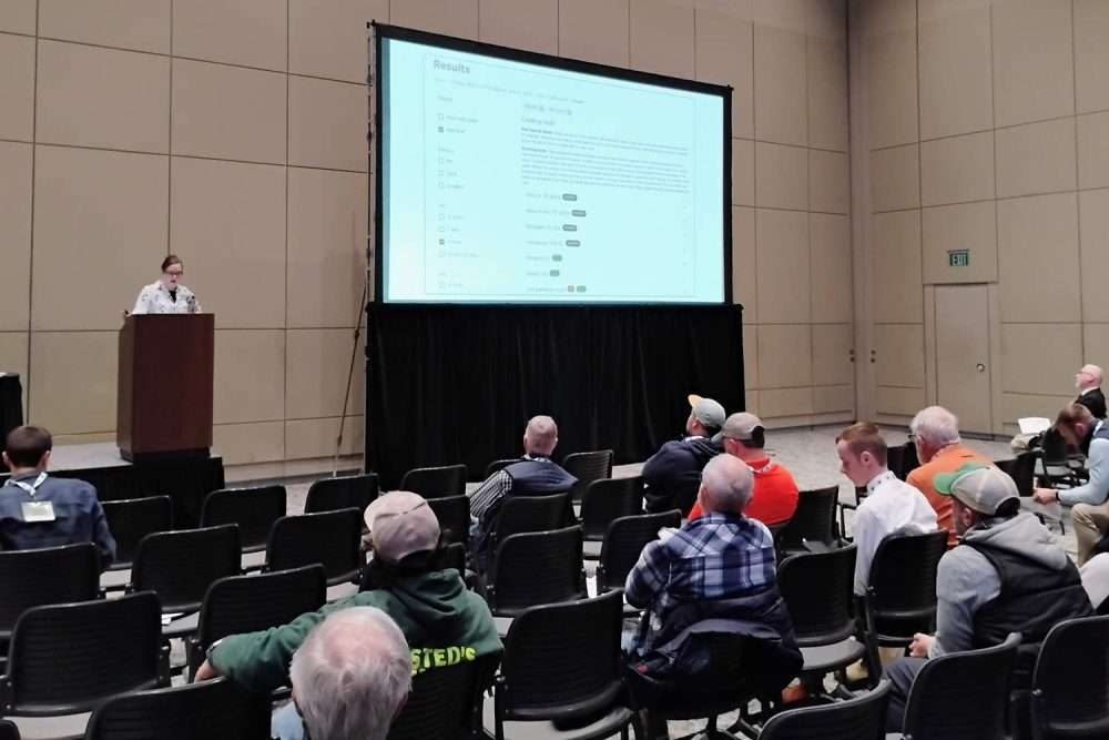 Michigan State University tree fruit integrator Jackie Perkins discusses the shifting climate and its implications for pest control during Day 1 of the 2025 Great Lakes EXPO, Dec. 9–11 in Grand Rapids. She spoke during the Apple 1 educational session. (Matt Milkovich/Good Fruit Grower)
