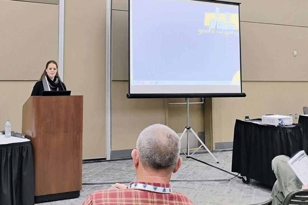 Michigan State University tree fruit educator Emily Lavely discusses peach variety and rootstock trials during the 2025 Great Lakes EXPO on Dec. 10. (Matt Milkovich/Good Fruit Grower)