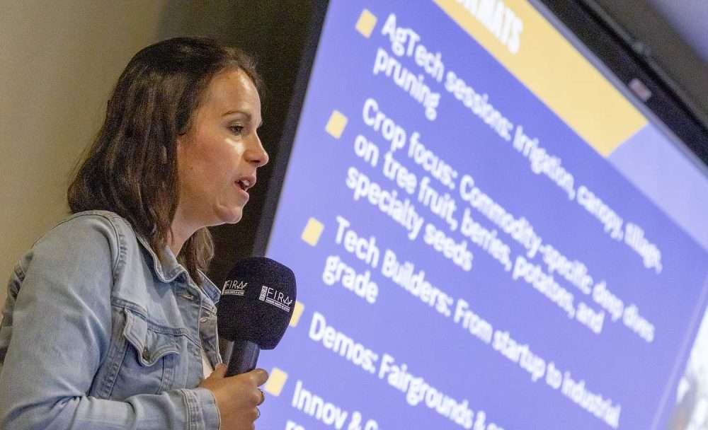 Maialen Cazenave, co-director of GOFAR, the Global Organization for Agricultural Robotics, speaks at a press conference on May 12, 2026, about bringing the FIRA USA conference to the Pacific Northwest in October at State Fair Park in Yakima, Washington. (TJ Mullinax/Good Fruit Grower)