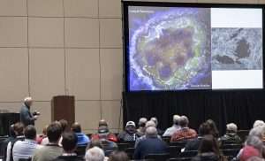 Michigan State University tree fruit pathologist George Sundin discusses fire blight during the Great Lakes Fruit, Vegetable and Farm Market EXPO in December. Here, he shows a microscopic view of shoot blight ooze infecting a tree’s parenchyma, the soft tissue that performs multiple functions including storing and transporting nutrients. (Matt Milkovich/Good Fruit Grower)