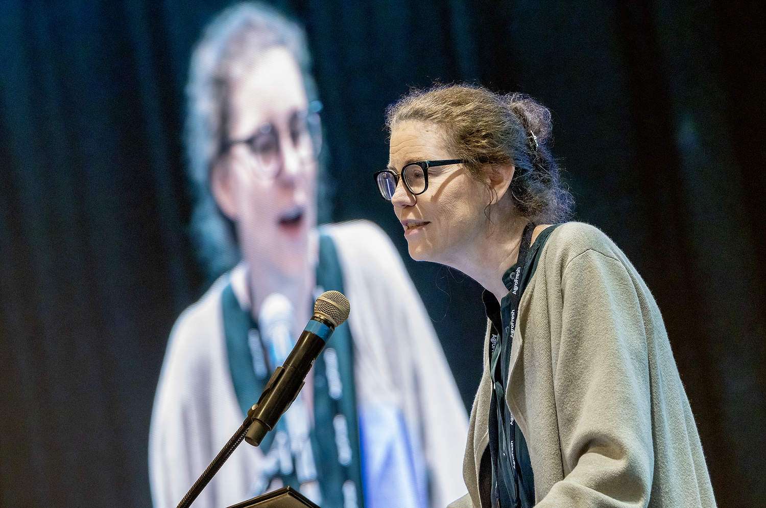 Megan McArdle, a Washington Post libertarian columnist, gives the keynote address on Monday at the Washington State Tree Fruit Association Annual Meeting at the Wenatchee Convention Center. (Ross Courtney/Good Fruit Grower)