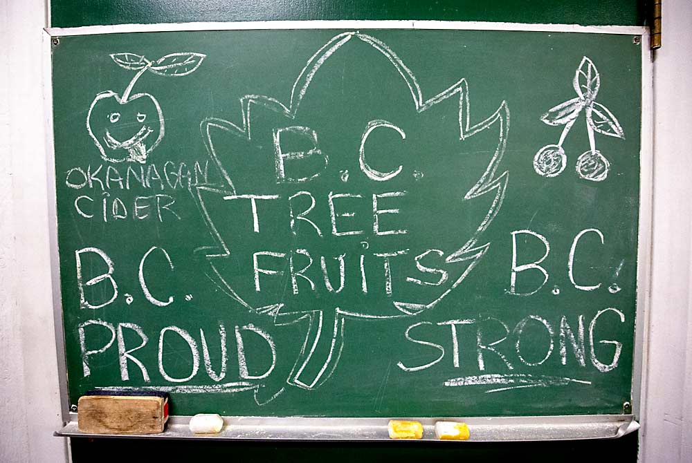 Growers’ dedication to the cooperative and the “B.C.” brand ran deep, as this message on a company chalkboard showed in 2018, but division between growers led to many board and management shakeups in recent years as the organization struggled with declining returns. (TJ Mullinax/Good Fruit Grower)