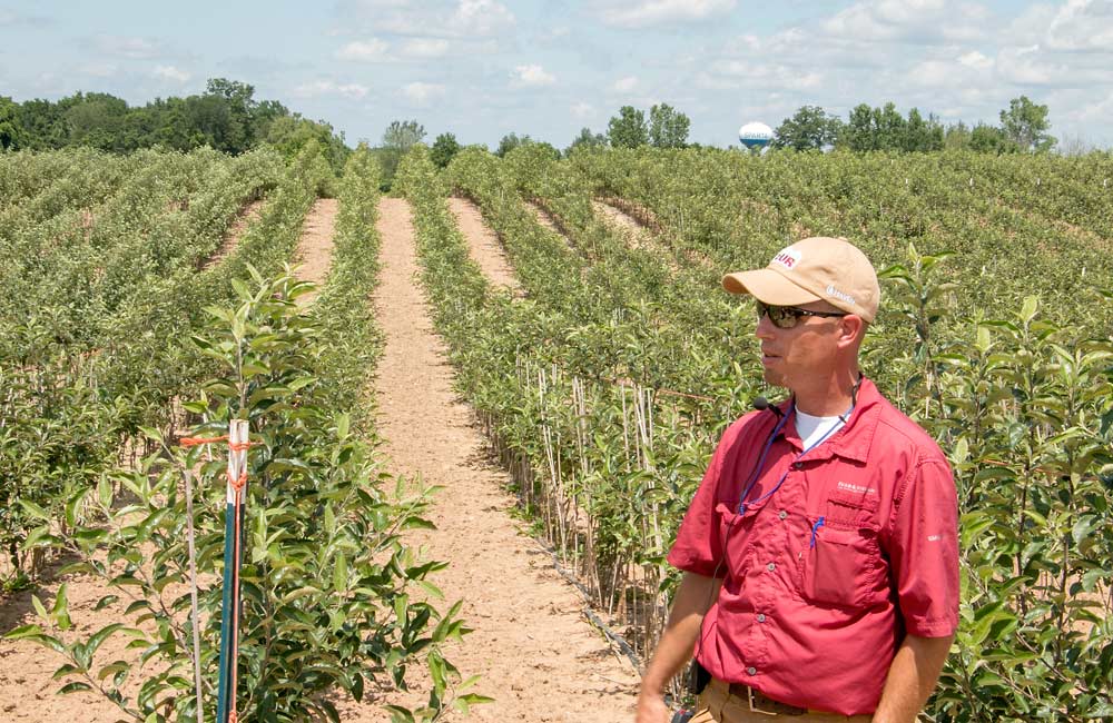Patrick Goodfellow, one of western Michigan’s biggest advocates for wind machines, shows off his nursery in Sparta during the International Tree Fruit Association’s Summer Tour in July near Grand Rapids. <b>(Ross Courtney/Good Fruit Grower)</b>
