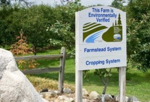 Jeff and Nita Send are proud of this sign that stands in front of their orchard, Cherry Lane Farms, in northwestern Lower Michigan. It signifies that the farm has voluntarily met a set of standards set by the Michigan Agriculture Environmental Assurance Program (MAEAP) in its cropping and farmstead systems, which together focus on such farming aspects as irrigation and water use, soil conservation, safe handling of fuels and proper storage of chemicals. (By Leslie Mertz)