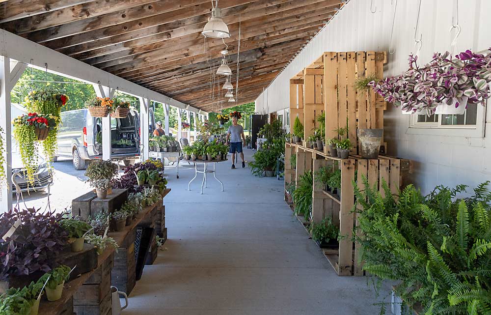 The Bramers’ farm market, Local Yokels Farm, sells flowers, berries, vegetables and other items, taking advantage of the peninsula’s popularity with summer visitors. (Matt Milkovich/Good Fruit Grower)