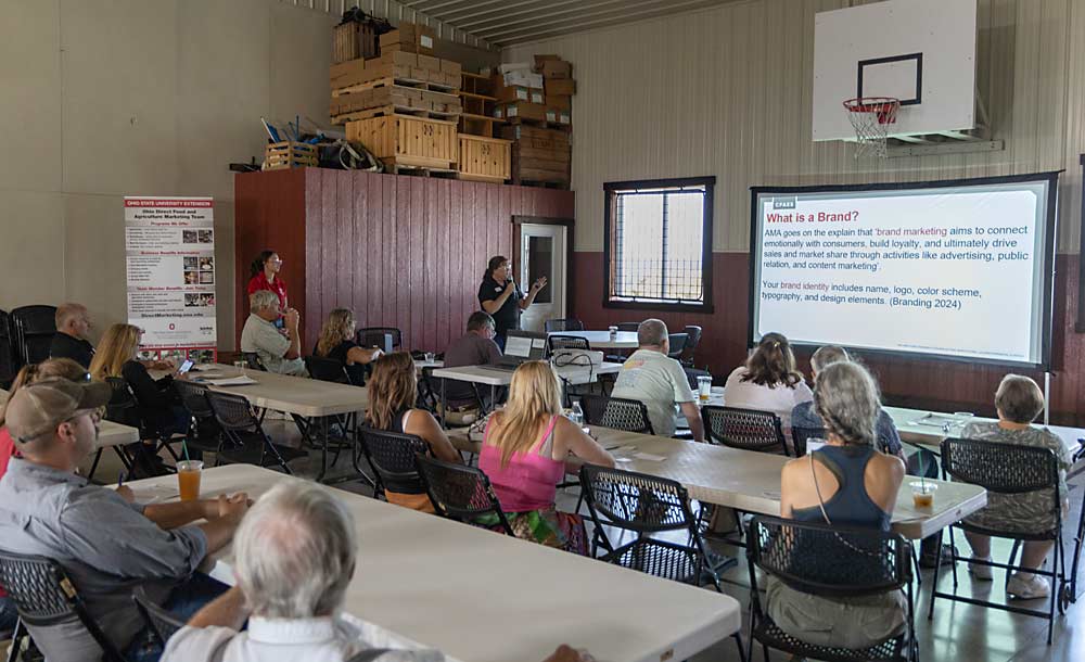 The Ohio State University direct-marketing specialist Christie Welch discusses the ins and outs of creating a brand for your business during the Ohio Agritourism Conference held in Walnut Creek in July. (Matt Milkovich/Good Fruit Grower)