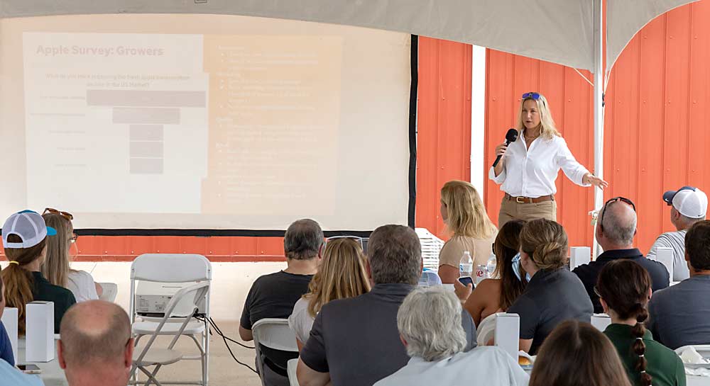 Julie DeJarnatt speaks about the need for a nationwide apple marketing campaign during Ridgefest, the Michigan Pomesters annual field day held Aug. 1 in Fremont, Michigan. (Matt Milkovich/Good Fruit Grower)