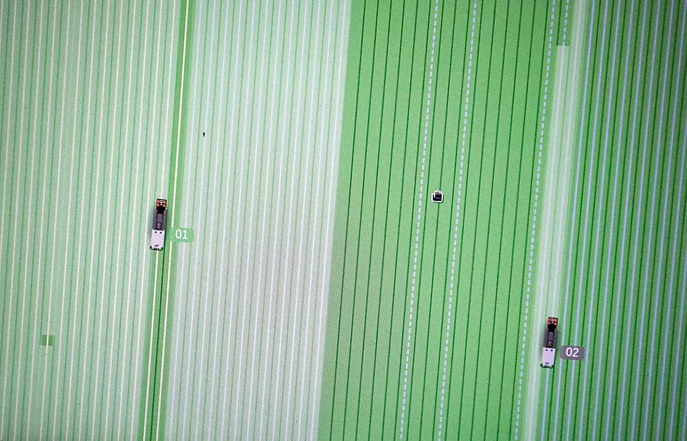 A screen in an operations office, located in a Stemilt Growers shop near Quincy, Washington, shows the progress of two Prospr driverless sprayers applying calcium in nearby blocks. (TJ Mullinax/Good Fruit Grower)