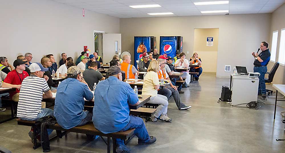 Elis Owens, director of Birko technical services, speaks to cleaning and sanitation workshop attendees in July 2016 in Zillah, Washington. (TJ Mullinax/Good Fruit Grower)