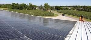 Solar panels cover the roof of a controlled atmosphere storage facility at Applewood Orchards in Deerfield, Michigan.