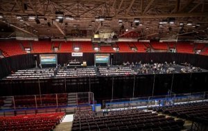 Attendees who braved the recent snowfall in the Pacific Northwest take a short break between sessions during the 2019 Washington Winegrowers Association convention and trade show on Tuesday, February 12, 2019. The main educational sessions take place here, on the ice of the Toyota Center at the Three Rivers Convention Center in Kennewick, Washington. (TJ Mullinax/Good Fruit Grower)