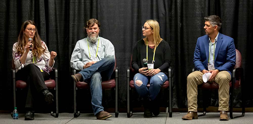 From left, Sadie Drury, Bill Dickard, Lacey Lybeck and Joe Cotta speak about vineyard labor challenges and solutions during the 2019 Washington Winegrowers Association convention and trade show on Wednesday, February 13, at the Three Rivers Convention Center in Kennewick, Washington. (TJ Mullinax/Good Fruit Grower)